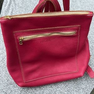 Portland Leather Goods Tote Backpack in color pomegranate.